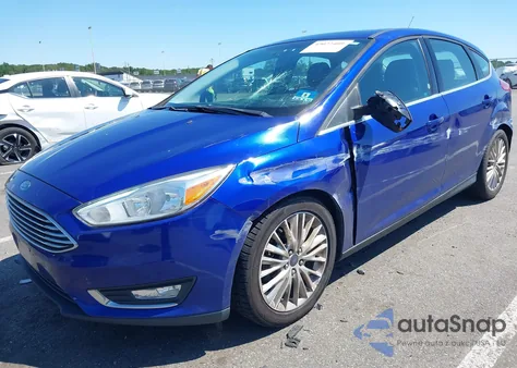 2015 Ford Focus Titanium from USA, damaged, VIN 1FADP3N29FL371969